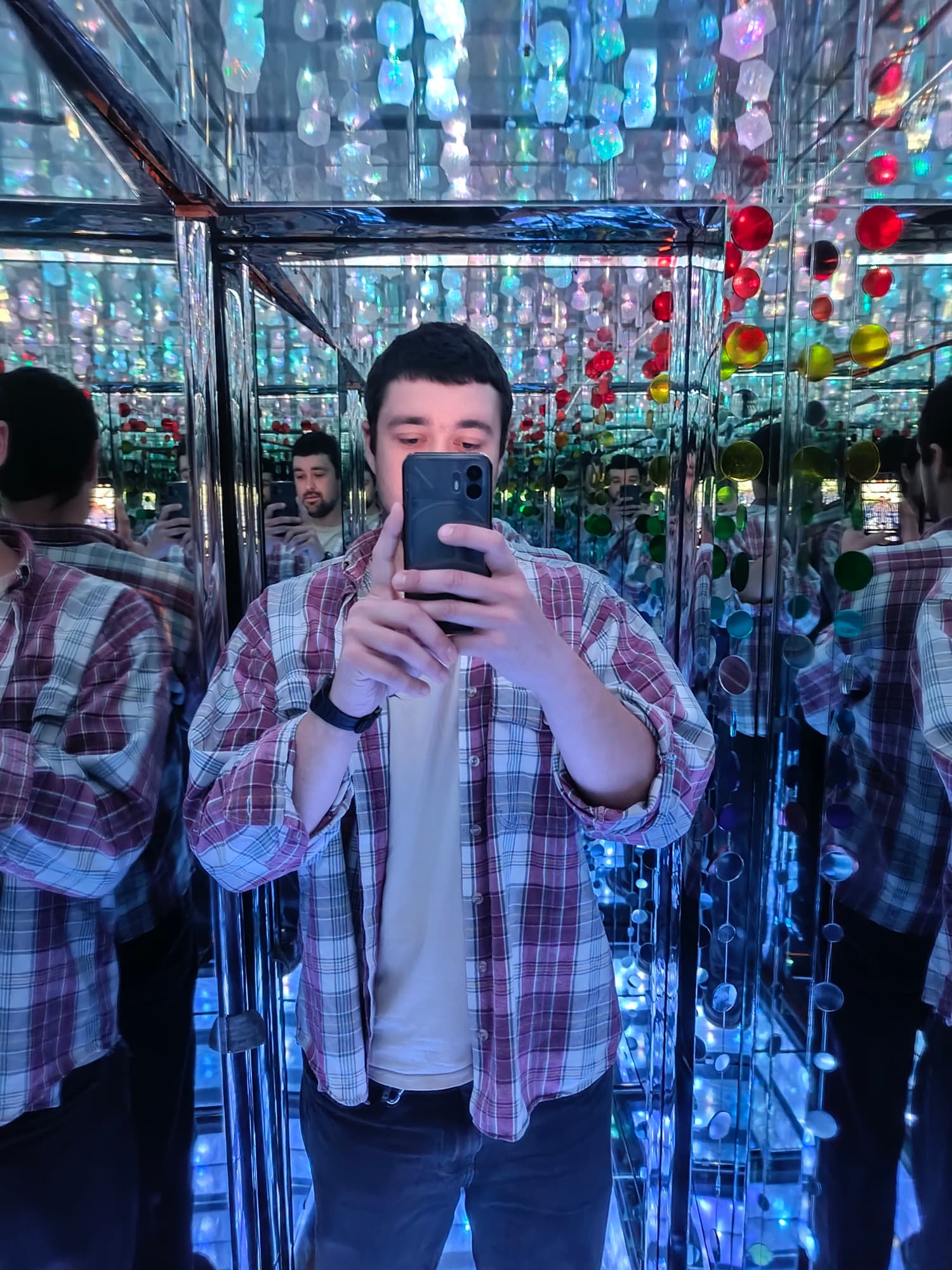 Inside the finished chamber, jeweled mosaic and LEDs repeating to infinity